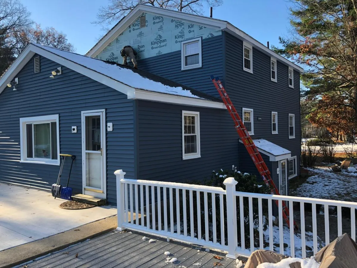 Professional siding installation on residential home by McCarthy Exteriors in Southern NH