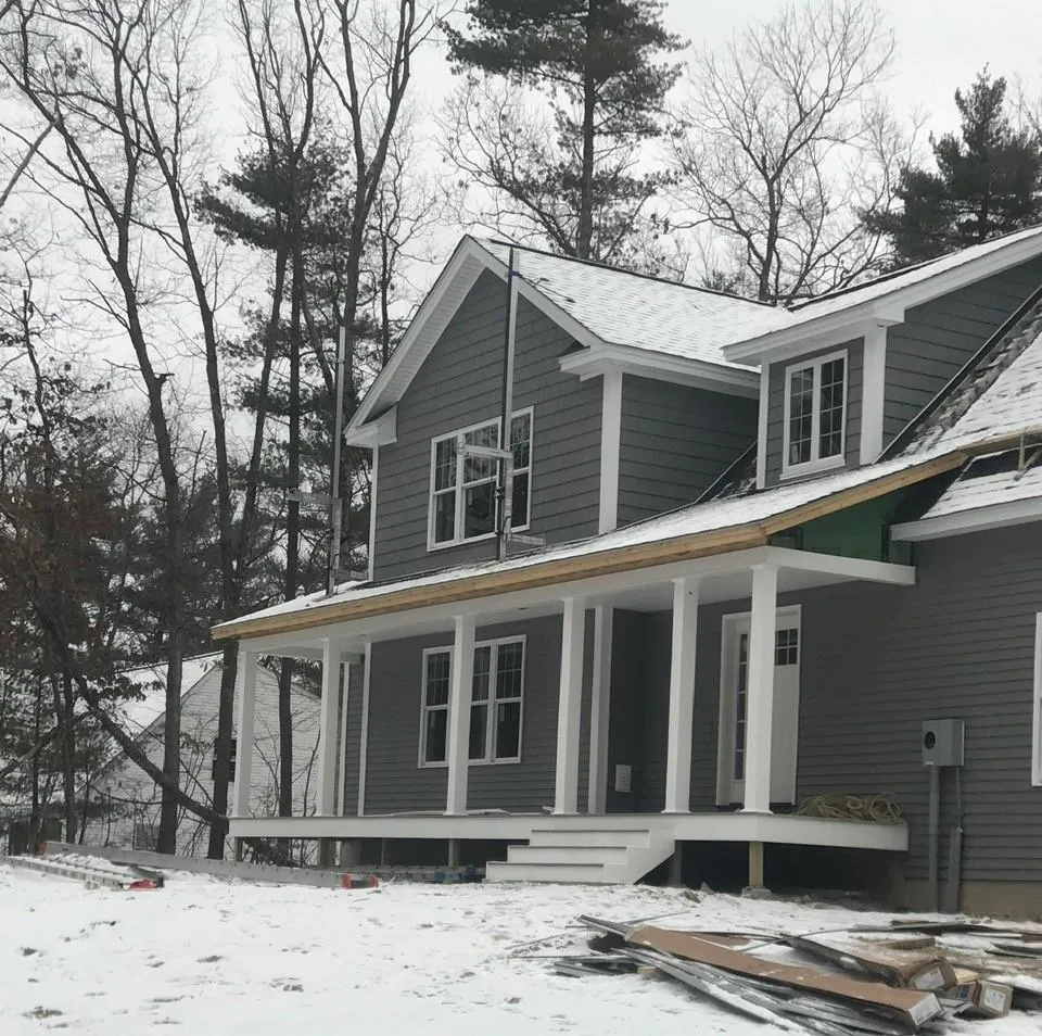 Completed siding and roofing installation by McCarthy Exteriors in Southern New Hampshire